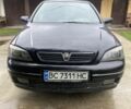 Черный Опель Астра, объемом двигателя 1.8 л и пробегом 240 тыс. км за 1490 $, фото 1 на Automoto.ua