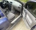 Черный Опель Астра, объемом двигателя 1.8 л и пробегом 240 тыс. км за 1490 $, фото 7 на Automoto.ua
