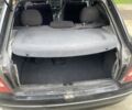 Черный Опель Астра, объемом двигателя 1.8 л и пробегом 240 тыс. км за 1490 $, фото 11 на Automoto.ua