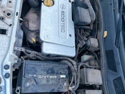 Черный Опель Астра, объемом двигателя 2 л и пробегом 300 тыс. км за 1300 $, фото 1 на Automoto.ua