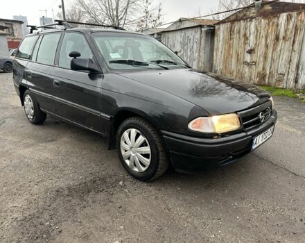 Черный Опель Астра, объемом двигателя 1.8 л и пробегом 100 тыс. км за 1250 $, фото 1 на Automoto.ua