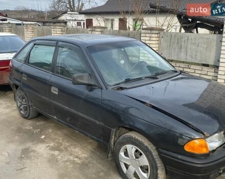 Черный Опель Астра, объемом двигателя 1.4 л и пробегом 200 тыс. км за 650 $, фото 1 на Automoto.ua