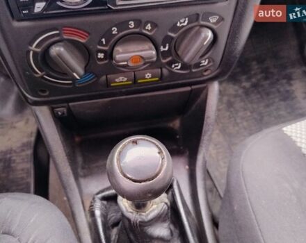 Черный Опель Астра, объемом двигателя 1.6 л и пробегом 320 тыс. км за 1000 $, фото 1 на Automoto.ua