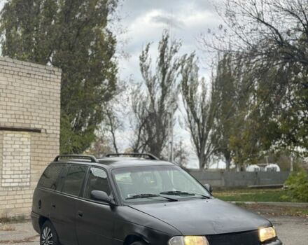 Черный Опель Астра, объемом двигателя 1.6 л и пробегом 341 тыс. км за 1000 $, фото 1 на Automoto.ua