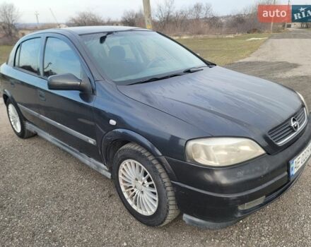Черный Опель Астра, объемом двигателя 1.6 л и пробегом 220 тыс. км за 2600 $, фото 1 на Automoto.ua