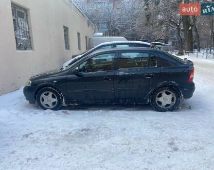 Черный Опель Астра, объемом двигателя 1.6 л и пробегом 215 тыс. км за 3600 $, фото 1 на Automoto.ua