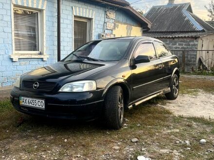 Черный Опель Астра, объемом двигателя 1.6 л и пробегом 264 тыс. км за 1300 $, фото 1 на Automoto.ua