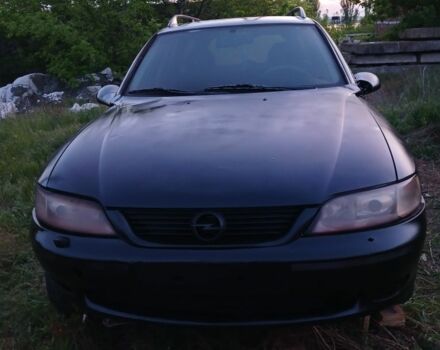 Черный Опель Астра, объемом двигателя 2 л и пробегом 200 тыс. км за 237 $, фото 1 на Automoto.ua