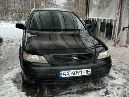 Черный Опель Астра, объемом двигателя 1.6 л и пробегом 250 тыс. км за 1900 $, фото 1 на Automoto.ua