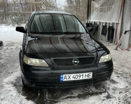 Черный Опель Астра, объемом двигателя 1.6 л и пробегом 250 тыс. км за 1900 $, фото 1 на Automoto.ua