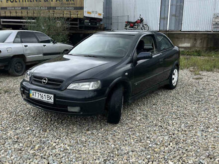 Черный Опель Астра, объемом двигателя 1.8 л и пробегом 300 тыс. км за 1600 $, фото 1 на Automoto.ua