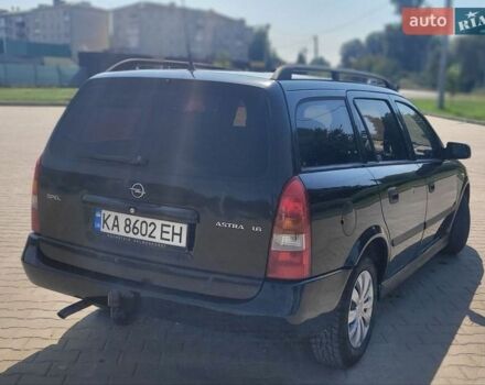 Черный Опель Астра, объемом двигателя 1.6 л и пробегом 290 тыс. км за 3200 $, фото 1 на Automoto.ua