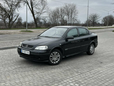 Черный Опель Астра, объемом двигателя 1.6 л и пробегом 205 тыс. км за 1999 $, фото 1 на Automoto.ua