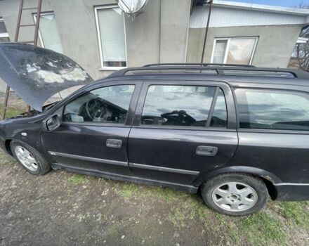 Черный Опель Астра, объемом двигателя 2 л и пробегом 370 тыс. км за 700 $, фото 1 на Automoto.ua