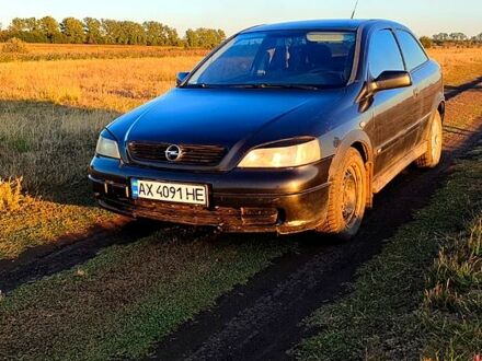 Чорний Опель Астра, об'ємом двигуна 1.6 л та пробігом 330 тис. км за 2000 $, фото 1 на Automoto.ua