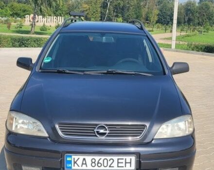 Черный Опель Астра, объемом двигателя 1.6 л и пробегом 295 тыс. км за 3500 $, фото 1 на Automoto.ua