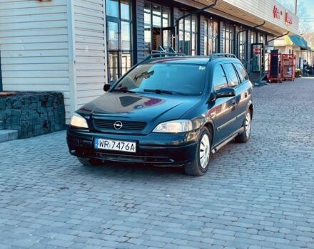 Черный Опель Астра, объемом двигателя 2 л и пробегом 400 тыс. км за 1250 $, фото 1 на Automoto.ua