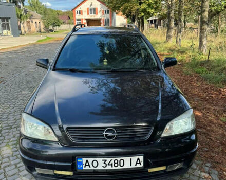 Черный Опель Астра, объемом двигателя 2 л и пробегом 327 тыс. км за 2750 $, фото 1 на Automoto.ua