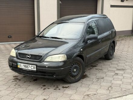 Черный Опель Астра, объемом двигателя 1.7 л и пробегом 666 тыс. км за 1375 $, фото 1 на Automoto.ua