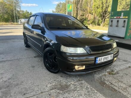 Черный Опель Астра, объемом двигателя 1.6 л и пробегом 251 тыс. км за 3500 $, фото 1 на Automoto.ua