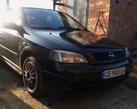 Черный Опель Астра, объемом двигателя 1.7 л и пробегом 413 тыс. км за 2400 $, фото 1 на Automoto.ua