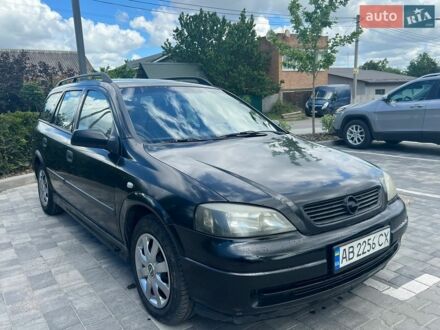 Черный Опель Астра, объемом двигателя 1.6 л и пробегом 385 тыс. км за 2550 $, фото 1 на Automoto.ua