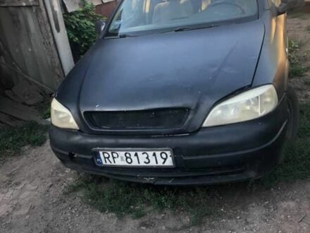 Черный Опель Астра, объемом двигателя 2 л и пробегом 300 тыс. км за 1094 $, фото 1 на Automoto.ua