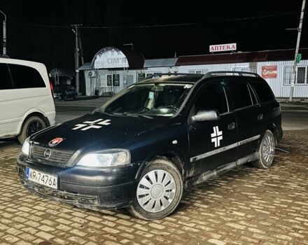 Черный Опель Астра, объемом двигателя 2 л и пробегом 245 тыс. км за 1150 $, фото 1 на Automoto.ua