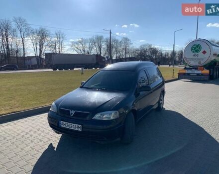 Черный Опель Астра, объемом двигателя 1.7 л и пробегом 176 тыс. км за 1750 $, фото 1 на Automoto.ua