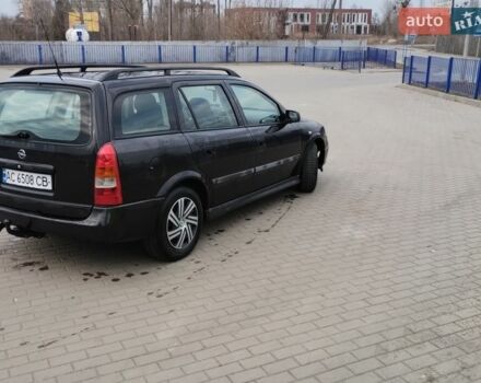 Черный Опель Астра, объемом двигателя 2 л и пробегом 330 тыс. км за 2500 $, фото 1 на Automoto.ua