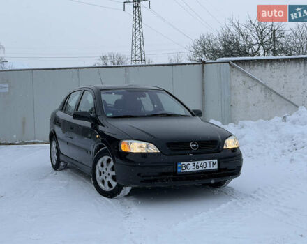 Черный Опель Астра, объемом двигателя 1.6 л и пробегом 288 тыс. км за 2950 $, фото 1 на Automoto.ua