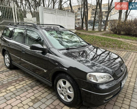 Черный Опель Астра, объемом двигателя 2 л и пробегом 337 тыс. км за 3850 $, фото 1 на Automoto.ua