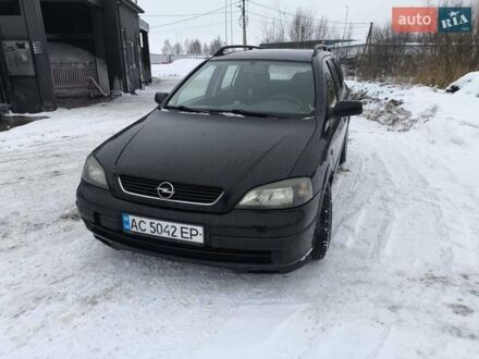 Черный Опель Астра, объемом двигателя 2.2 л и пробегом 350 тыс. км за 2800 $, фото 1 на Automoto.ua