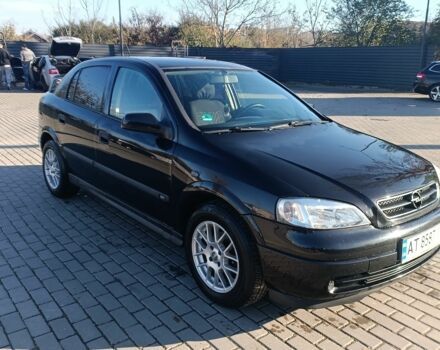 Черный Опель Астра, объемом двигателя 1.6 л и пробегом 250 тыс. км за 4000 $, фото 1 на Automoto.ua