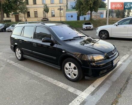 Черный Опель Астра, объемом двигателя 2 л и пробегом 395 тыс. км за 4200 $, фото 1 на Automoto.ua