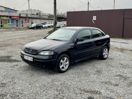 Черный Опель Астра, объемом двигателя 1.6 л и пробегом 258 тыс. км за 1350 $, фото 1 на Automoto.ua