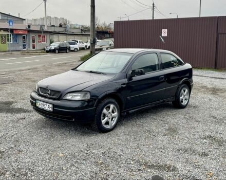 Черный Опель Астра, объемом двигателя 1.6 л и пробегом 258 тыс. км за 1350 $, фото 1 на Automoto.ua