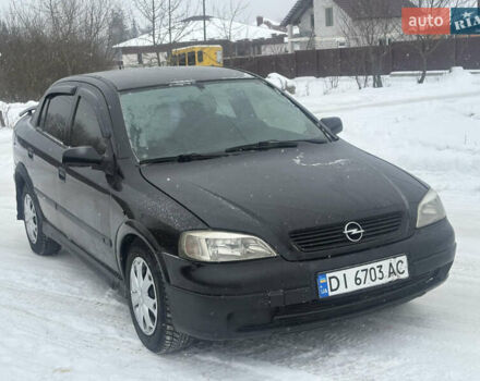 Черный Опель Астра, объемом двигателя 1.4 л и пробегом 280 тыс. км за 2350 $, фото 1 на Automoto.ua
