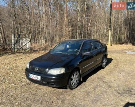 Черный Опель Астра, объемом двигателя 1.39 л и пробегом 270 тыс. км за 2400 $, фото 1 на Automoto.ua