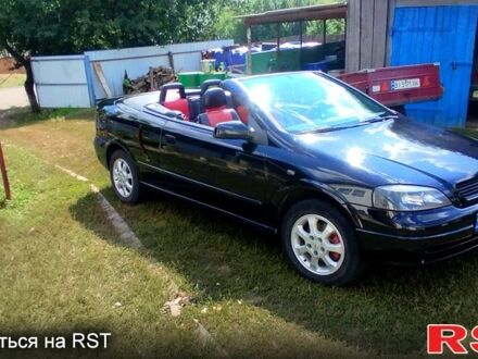 Черный Опель Астра, объемом двигателя 1.8 л и пробегом 200 тыс. км за 4000 $, фото 1 на Automoto.ua