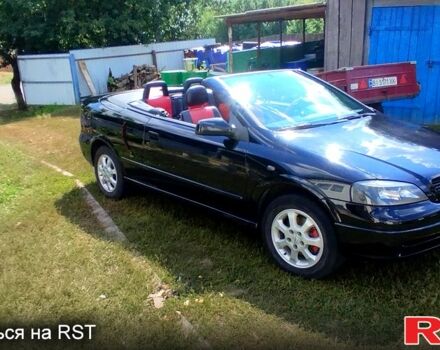 Черный Опель Астра, объемом двигателя 1.8 л и пробегом 200 тыс. км за 4000 $, фото 1 на Automoto.ua
