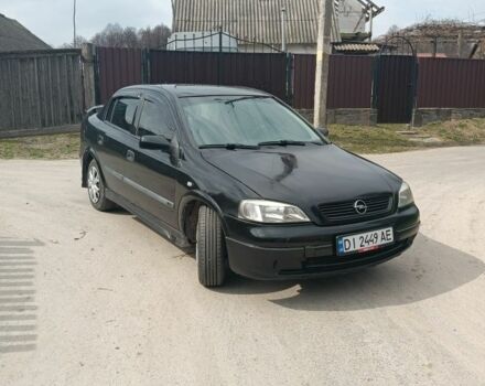 Черный Опель Астра, объемом двигателя 1.4 л и пробегом 270 тыс. км за 3200 $, фото 1 на Automoto.ua