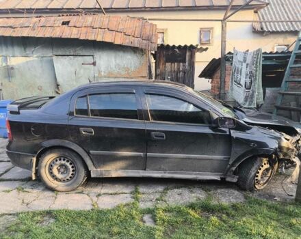 Черный Опель Астра, объемом двигателя 1.4 л и пробегом 200 тыс. км за 800 $, фото 1 на Automoto.ua