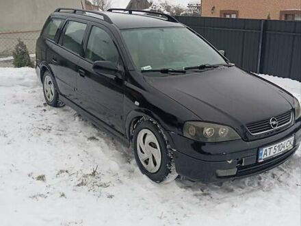 Черный Опель Астра, объемом двигателя 1.99 л и пробегом 318 тыс. км за 2700 $, фото 1 на Automoto.ua
