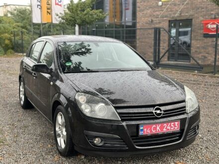 Черный Опель Астра, объемом двигателя 1.4 л и пробегом 212 тыс. км за 5200 $, фото 1 на Automoto.ua