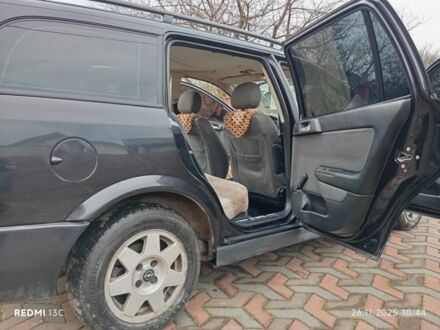 Чорний Опель Астра, об'ємом двигуна 1.6 л та пробігом 290 тис. км за 4000 $, фото 1 на Automoto.ua