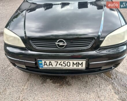 Черный Опель Астра, объемом двигателя 1.6 л и пробегом 240 тыс. км за 4000 $, фото 1 на Automoto.ua