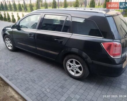 Черный Опель Астра, объемом двигателя 1.8 л и пробегом 218 тыс. км за 3500 $, фото 1 на Automoto.ua