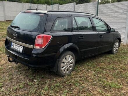 Черный Опель Астра, объемом двигателя 1.6 л и пробегом 200 тыс. км за 2199 $, фото 1 на Automoto.ua