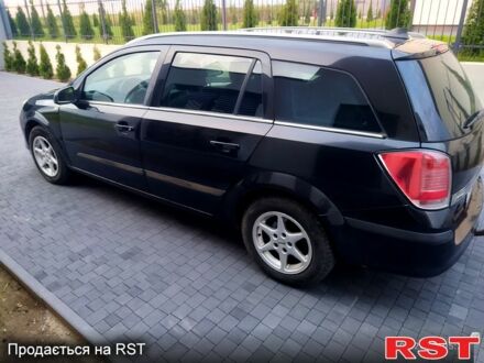 Черный Опель Астра, объемом двигателя 1.8 л и пробегом 218 тыс. км за 3500 $, фото 1 на Automoto.ua